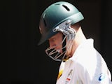 Chris Rogers of Australia looks on during day one of the First Ashes Test match between Australia and England at The Gabba on November 21, 2013 