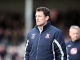 Lincoln City manager Chris Sutton looks on during the Coca Cola League Two Match between Lincoln City and Northampton Town at Sincil Bank Stadium on March 27, 2010