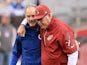 Head Coach Chuck Pagano of the Indianapolis Colts talks with Head Coach Bruce Arians of the Arizona Cardinals during pregame at University of Phoenix Stadium on November 24, 2013