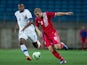 Daniel Duarte of Gibraltar competes for the ball with Karim Guede of Slovakia during an international friendly match on November 19, 2013