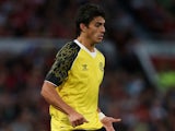 Sevilla's Diego Perotti in action during a friendly match against Manchester United on August 9, 2013