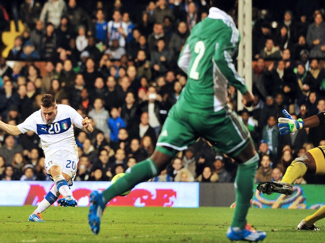 Italy's midfielder Emanuele Giaccherini scores his team's second goal during the International friendly football match between Italy and Nigeria at Craven Cottage in London on November 18, 2013