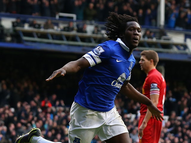 Romelu Lukaku of Everton celebrates scoring his team's second goal during the Barclays Premier League match between Everton and Liverpool at Goodison Park on November 23, 2013