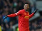 Daniel Sturridge of Liverpool celebrates scoring his team's third goal during the Barclays Premier League match between Everton and Liverpool at Goodison Park on November 23, 2013