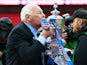 Wigan chairman Dave Whelan kisses the trophy following his team's 1-0 victory during the FA Cup with Budweiser Final between Manchester City and Wigan Athletic at Wembley Stadium on May 11, 2013
