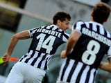 Juventus' Fernando Llorente celebrates after scoring the opening goal against Livorno during their Serie A match on November 24, 2013