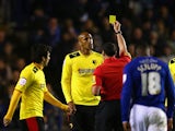 Fitz Hall of Watford receives a yellow card from referee Neil Swarbrick after a tackle on Andy King of Leicester City during the npower Championship Play Off Semi Final First Leg match between Leicester City and Watford at The King Power Stadium on May 9,