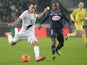 Rennes' Algerian midfielder Foued Kadir vies with Bordeaux's Cameroonese midfielder Landry Nguemo during the French L1 football match Rennes vs Bordeaux on November 23, 2013