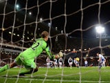 Frank Lampard of Chelsea scores their opening goal past Jussi Jaaskelainen of West Ham from the penalty spot during the Barclays Premier League match on November 23, 2013