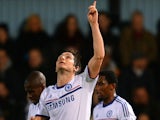 Frank Lampard of Chelsea celebrates scoring their first goal from the penalty spot during the Barclays Premier League match against West Ham United on November 23, 2013