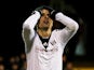 Dimitar Berbatov of Fulham reacts after a missed chance on goal during the Barclays Premier League match between Fulham and Swansea City at Craven Cottage on November 23, 2013