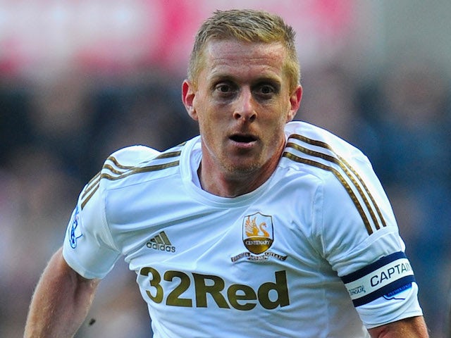 Swansea player Garry Monk in action during the Barclays Premier League match between Swansea City and Newcastle United at Liberty Stadium on March 2, 2013