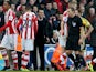 Sunderland manager Gustavo Poyet remonstrates with referee Kevin Friend during the Premier League match between Stoke City and Sunderland at Britannia Stadium on November 23, 2013
