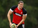 Ian Evans prepares to offload the ball during a Wales rugby training session at Scotch College on June 14, 2012