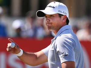 Day rallies to earn share of lead at US Open