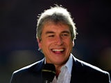 TV presenter John Inverdale shares a joke before the RBS Six Nations match between Wales and Italy at the Millennium stadium on March 10, 2012