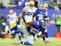 Jon Beason #52 of the New York Giants intercepts a pass from Scott Tolzien of the Green Bay Packers at MetLife Stadium on November 17, 2013