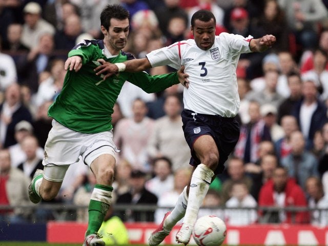 Keith Gillespie and Ashley Cole battle for possession on March 26, 2005.
