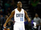 Kemba Walker #15 of the Charlotte Bobcats reacts after making a basket during their game against the Brooklyn Nets at Time Warner Cable Arena on November 20, 2013