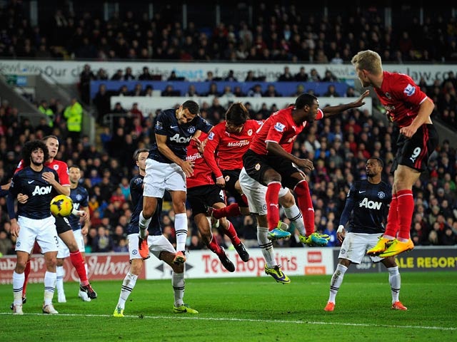 Cardiff's Kim Bo-Kyung heads in the late equaliser against Manchester United during their Premier League match on November 24, 2013