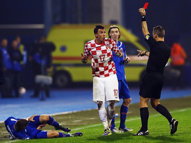Croatia's Mario Mandzukic is sent off against Iceland during their World Cup play off match on November 19, 2013