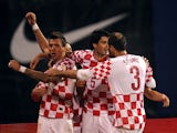 Croatia's Mario Mandzukic celebrates with teammates after scoring the opening goal against Iceland during their World Cup play off match on November 19, 2013