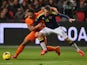 Netherlands' Memphis Depay and Columbia's Santiago Arias battle for the ball during their international friendly match on November 19, 2013