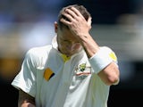 Australia captain Michael Clarke leaves the field after being dismissed by Stuart Broad of England during day one of the First Ashes Test match on November 21, 2013