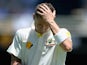 Australia captain Michael Clarke leaves the field after being dismissed by Stuart Broad of England during day one of the First Ashes Test match on November 21, 2013