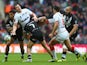 Brett Ferres of England knocks on as he is challenged by Shaun Johnson and Roger Tuivasa-Scheck of New Zealand during the Rugby League World Cup Semi Final match between New Zealand and England at Wembley Stadium on November 23, 2013