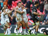 Sam Burgess of England celebrates scoring his sides third try during the Rugby League World Cup Semi Final match between New Zealand and England at Wembley Stadium on November 23, 2013