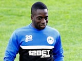 Nouha Dicko warms up during the Wigan Athletic Training Session prior to the Europa League match between SV Zulte Waregem on September 18, 2013