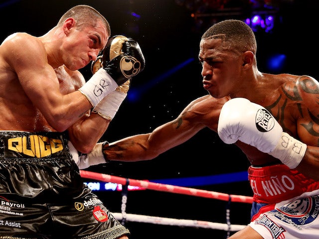 Scott Quigg in action with Yoandris Salinas during their WBA World Super Bantamweight Championship bout at O2 Arena on October 5, 2013