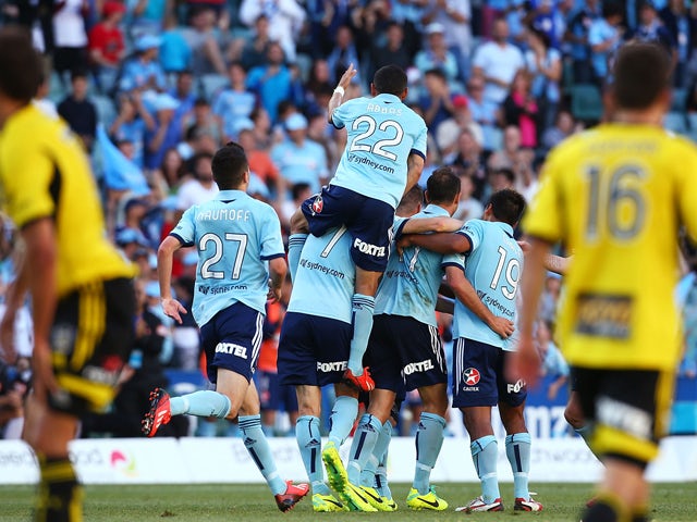 Sydney FC celebrate a goal by Richard Garcia during the round seven A-League match between Sydney FC and the Wellington Phoenix at Allianz Stadium on November 23, 2013