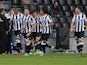 Udinese's Thomas Heurtaux is congratulated by teammates after scoring the opening goal against Fiorentina on November 24, 2013