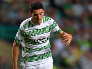 Celtic's Tomas Rogic in action against Cliftonville during their Champions League second qualifying round second leg match on July 23, 2013