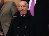 Future Crystal Palace manager Tony Pulis looks on from the stands prior to the Barclays Premier League match between Hull City and Crystal Palace on November 23, 2013