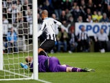Yoan Gouffran of Newcastle United scores the second goal past Norwich keeper John Ruddy during the Barclays Premier League match on November 23, 2013