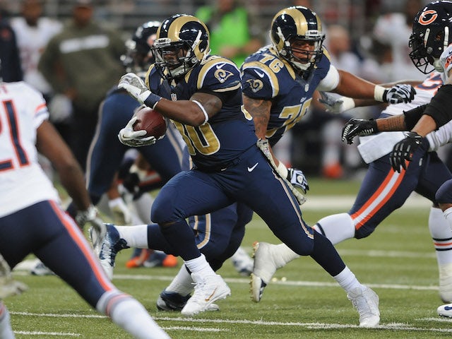 Zac Stacy of the St. Louis Rams rushes against the Chicago Bears in the second quarter at the Edward Jones Dome on November 24, 2013