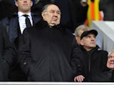 Arsenal's Russian shareholder Alisher Usmanov looks on before the English Premier League football match between Tottenham Hotspur and Arsenal at White Hart Lane in north London on March 3, 2013