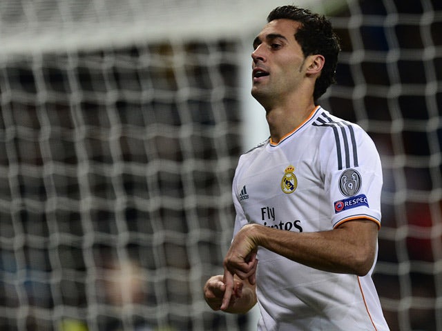 Real Madrid's Alvaro Arbeloa celebrates after scoring his team's second goal against Galatasaray during their Champions League group match on November 27, 2013