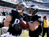 Zach Ertz #86 of the Philadelphia Eagles celebrates his touchdown with teammate James Casey #85 in the first quarter against the Arizona Cardinals on December 1, 2013