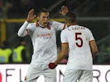 Kevin Strootman of AS Roma celebrates his goal with team-mate Leandro Castan during the Serie A match between Atalanta BC and AS Roma at Stadio Atleti Azzurri d'Italia on December 1, 2013