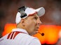 Nebraska Cornhuskers head coach Bo Pelini eyes the clock as his offense runs out the remaining minutes of their game against the Southern Miss Golden Eagles at Memorial Stadium on September 7, 2013