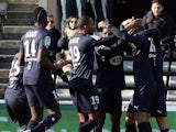 Bordeaux's players celebrate after scoring a goal during the French L1 football match between Bordeaux and Ajaccio, on December 1, 2013