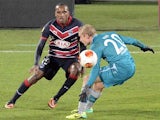 Bordeaux's Nicolas Maurice-Belay and Frankfurt's Sebastian Rode battle for the ball during their Europa League group match on November 28, 2013