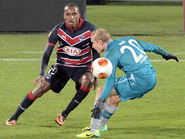 Bordeaux's Nicolas Maurice-Belay and Frankfurt's Sebastian Rode battle for the ball during their Europa League group match on November 28, 2013