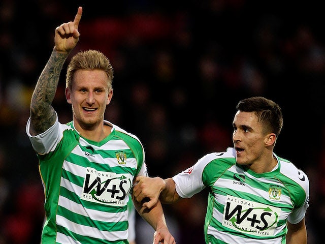 Byron Webster of Yeovil celebrates after opening the scoring during the Sky Bet Championship match between Watford and Yeovil Town at Vicarage Road on November 30, 2013