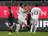 Marzoratti Lino of Sassuolo celebrates with team-mates after scoring a goal during the Serie A match between Cagliari Calcio and US Sassuolo Calcio at Stadio Sant'Elia on December 1, 2013