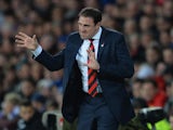 Manager Malky Mackay of Cardiff shouts orders to his players during the Barclays Premier League match between Cardiff City and Arsenal at Cardiff City Stadium on November 30, 2013